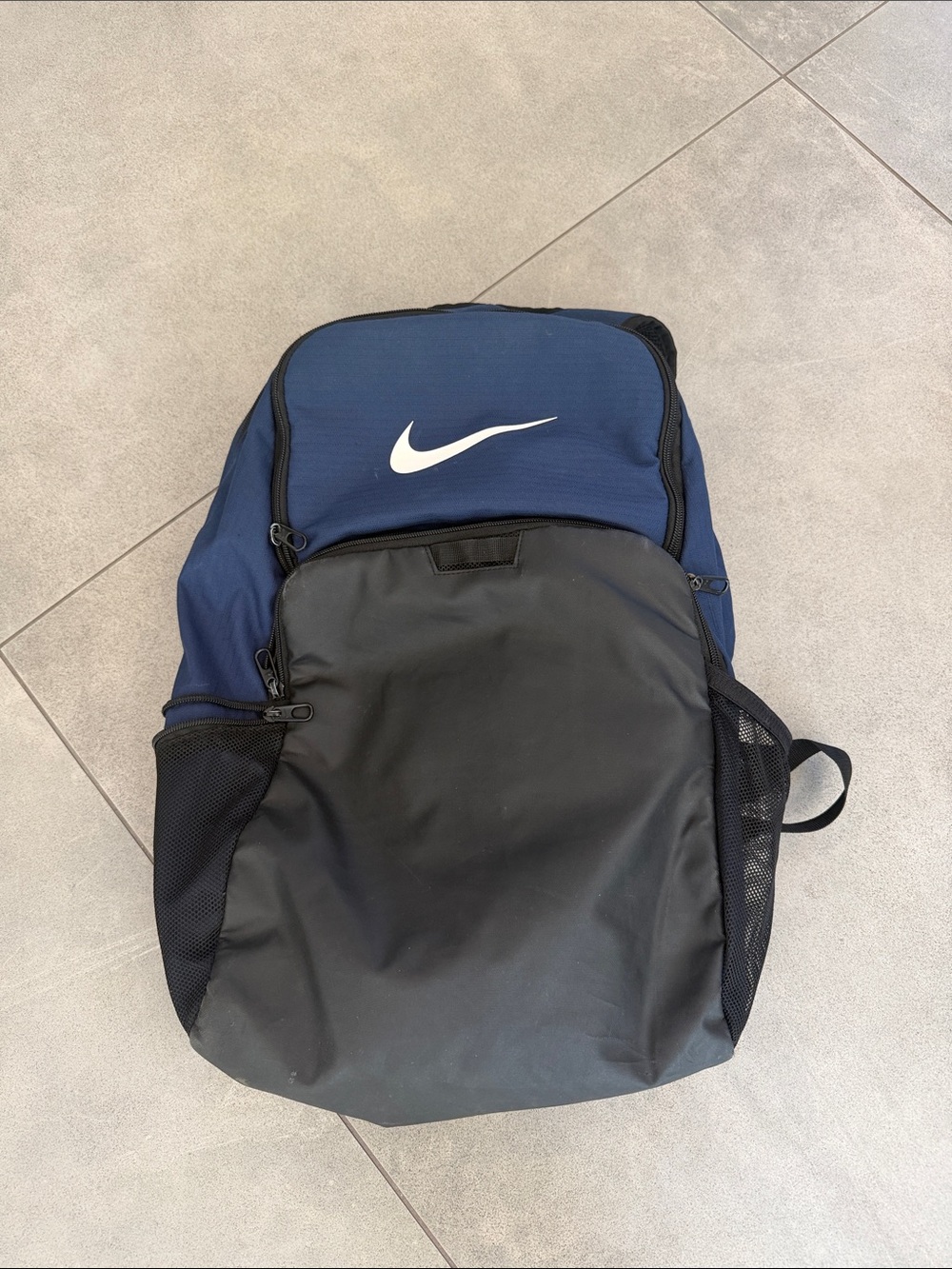 Nike Blue and Black Sports Backpack with White Swoosh